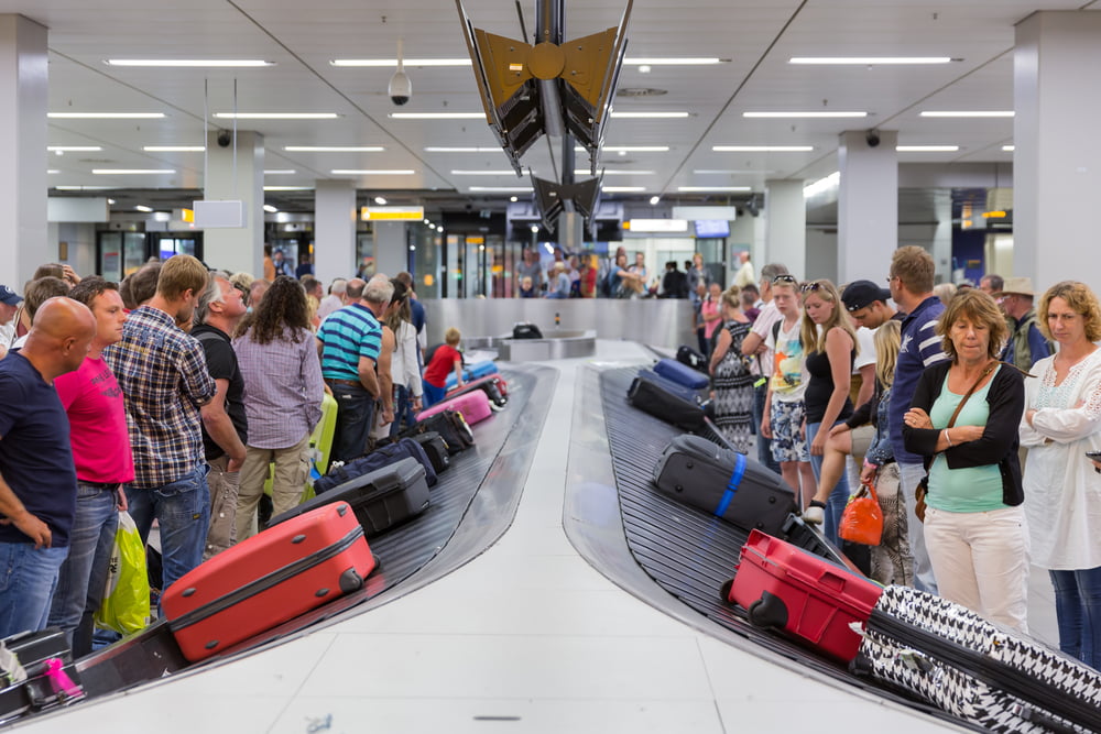 Lang wachten op je koffer bij aankomst op Schiphol
